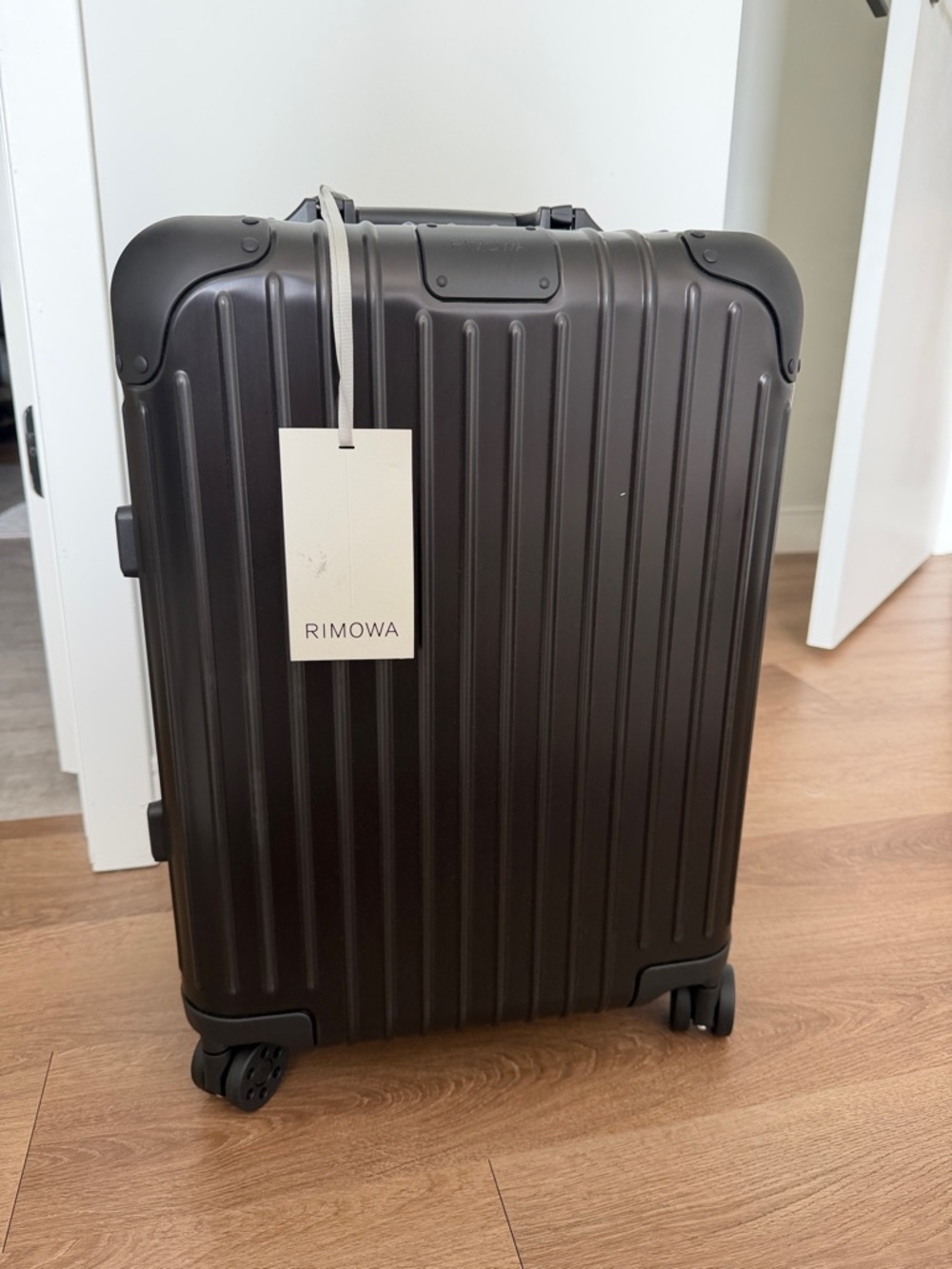 RIMOWA Black Hard-Shell Carry-On Spinner